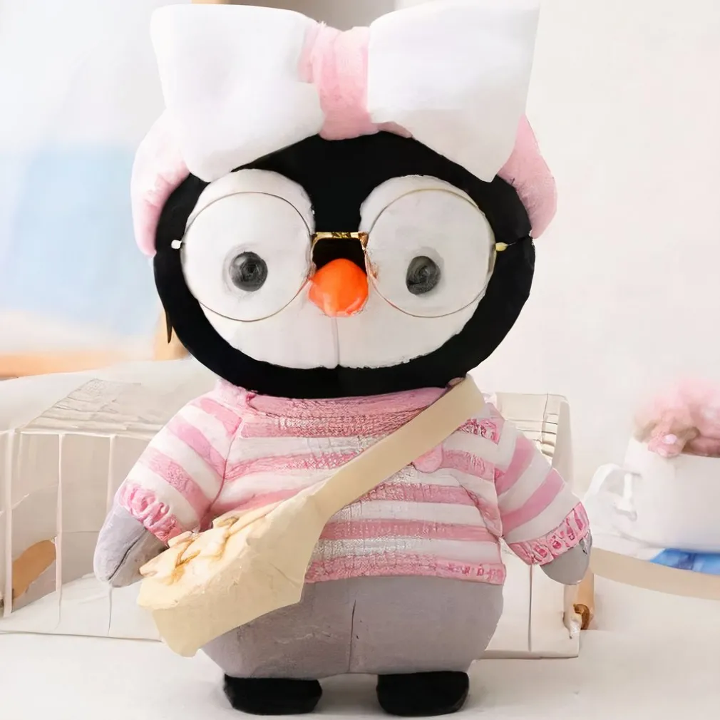 Peluche pingouin pull rose
