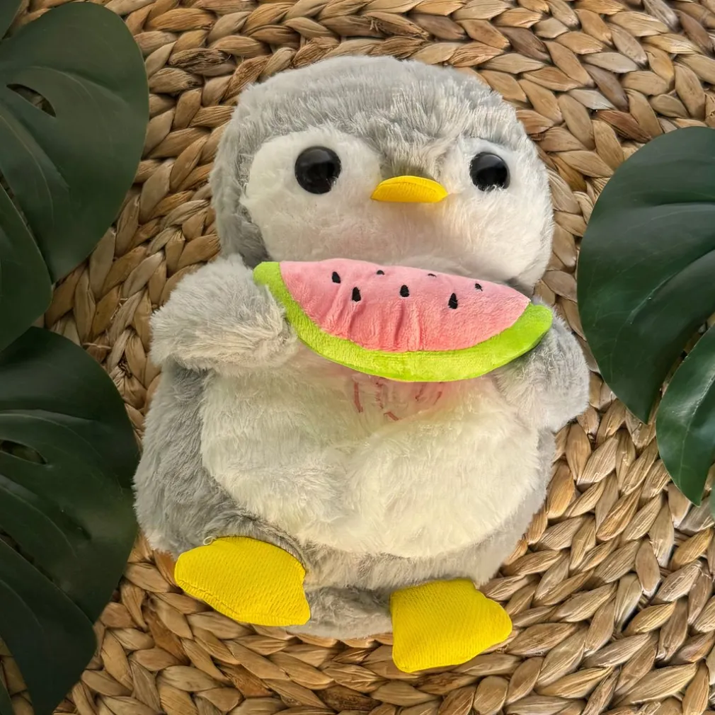 Peluche pingouin qui respire avec berceuses intégrées