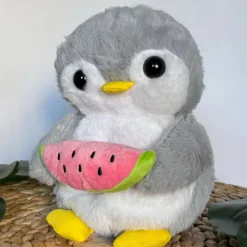 Peluche pingouin qui respire avec berceuses intégrées