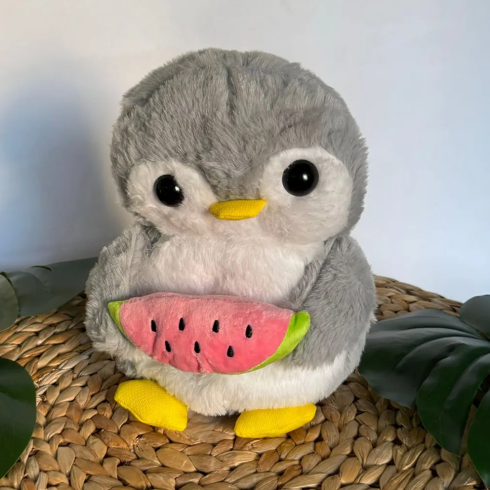 Peluche pingouin qui respire avec berceuses intégrées