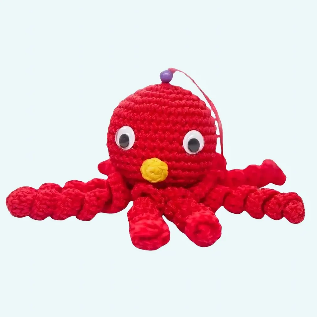 Peluche poulpe rouge douce tressée pour enfant