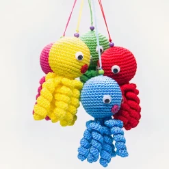 Peluche poulpe verte douce tressée pour enfant