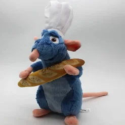 Peluche Ratatouille avec une baguette de pain