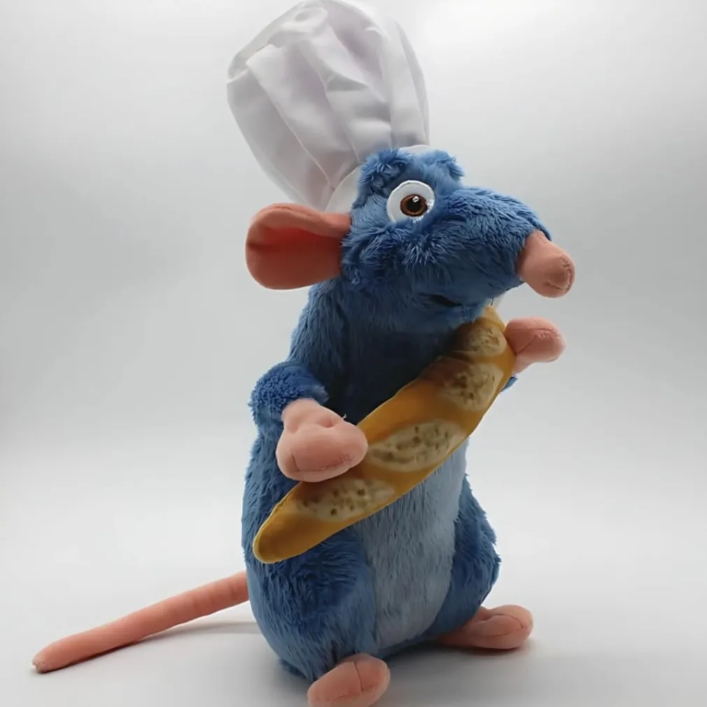 Peluche Ratatouille avec une baguette de pain