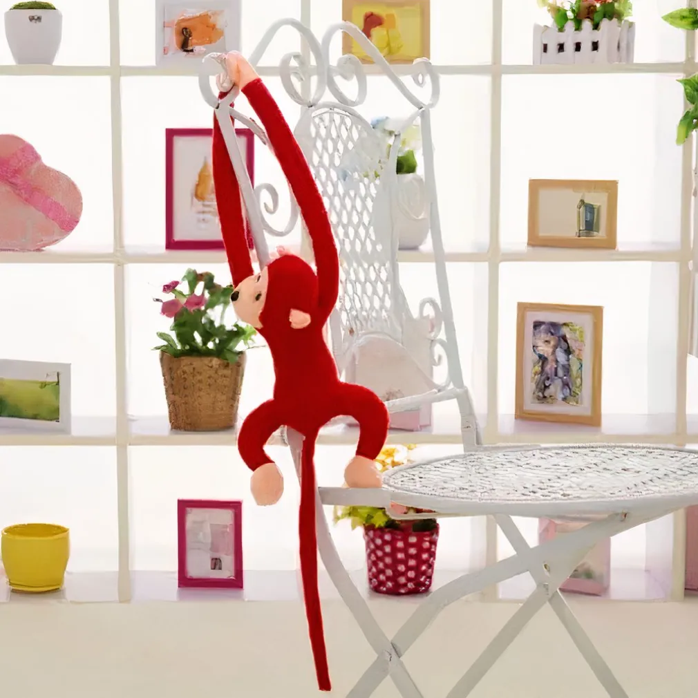 Peluche singe kawaii longue queue rouge