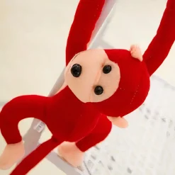 Peluche singe kawaii longue queue rouge