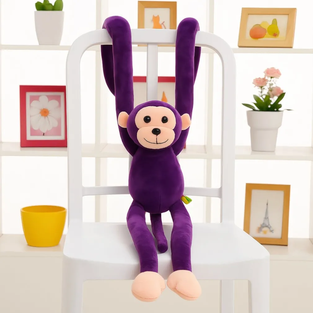 Peluche singe kawaii longue queue violette
