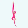 Peluche singe kawaii longue queue fushia