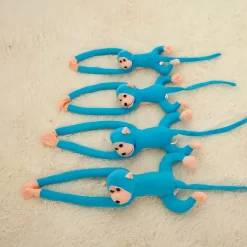 Peluche singe kawaii longue queue bleue