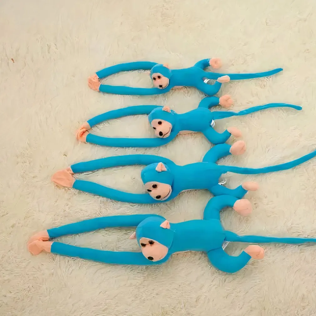 Peluche singe kawaii longue queue bleue