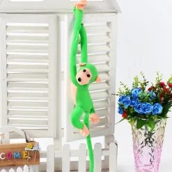 Peluche singe kawaii longue queue verte