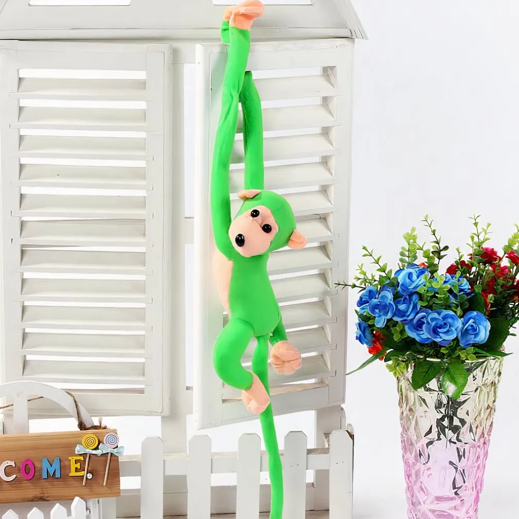 Peluche singe kawaii longue queue verte
