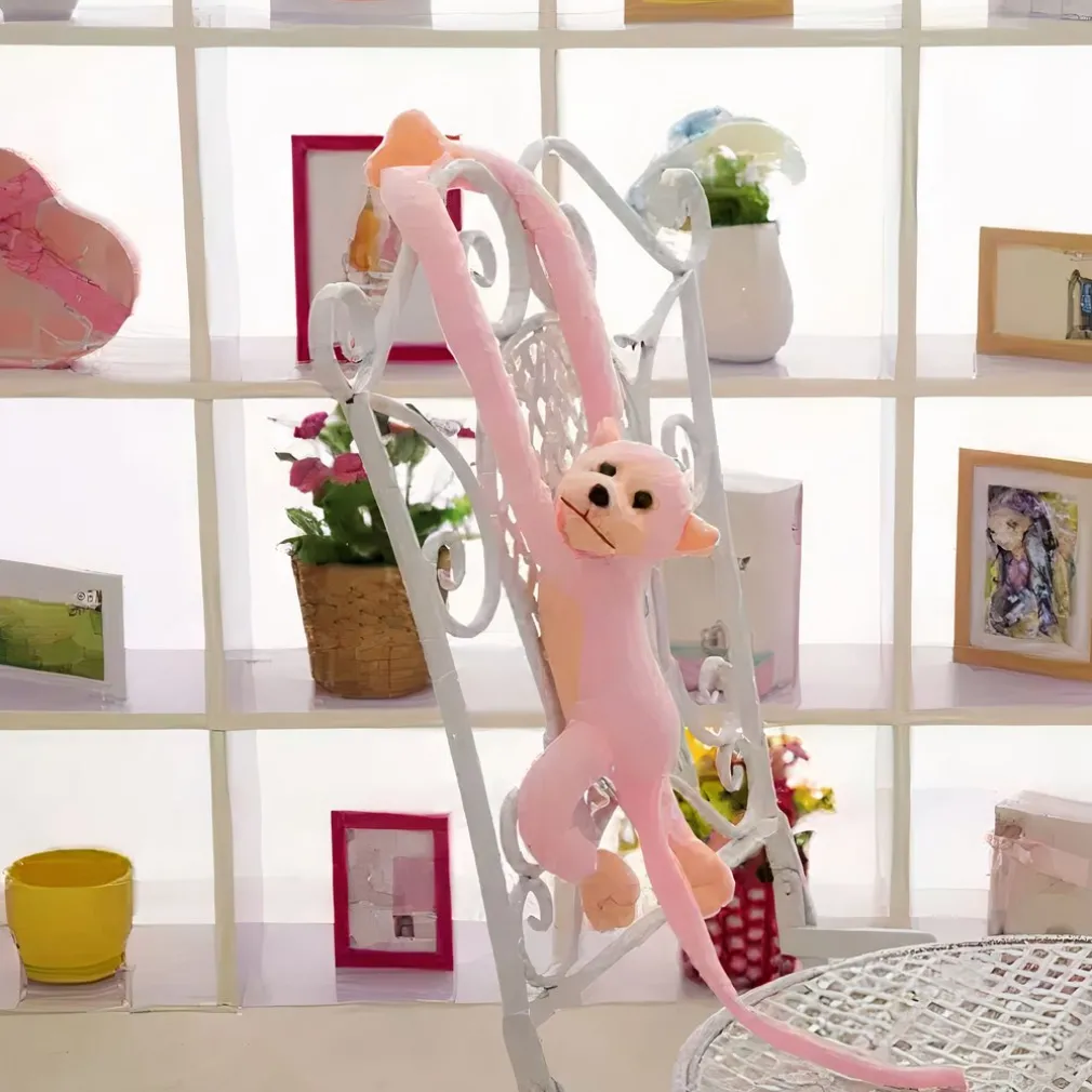 Peluche singe kawaii longue queue rose