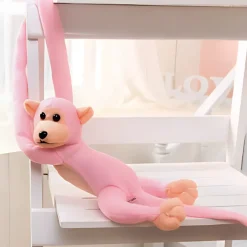 Peluche singe kawaii longue queue rose