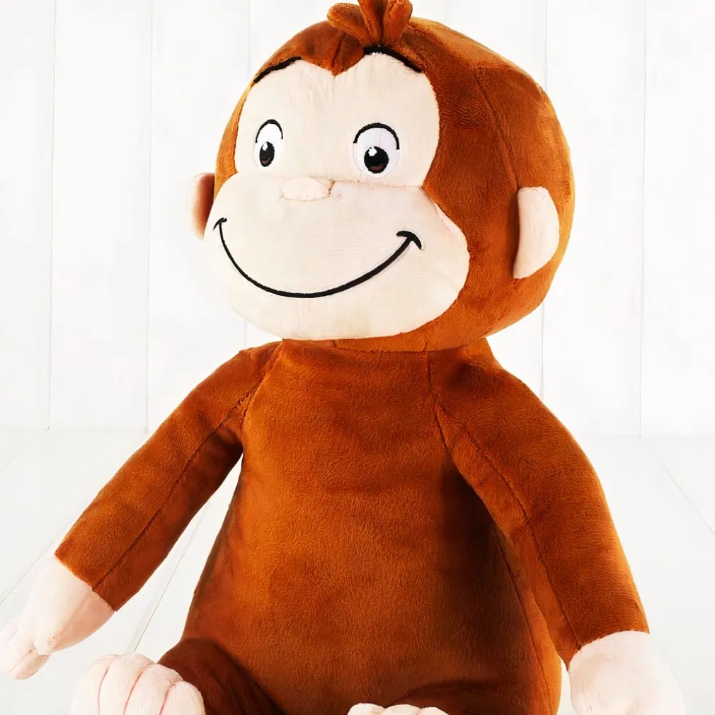 Peluche singe souriante