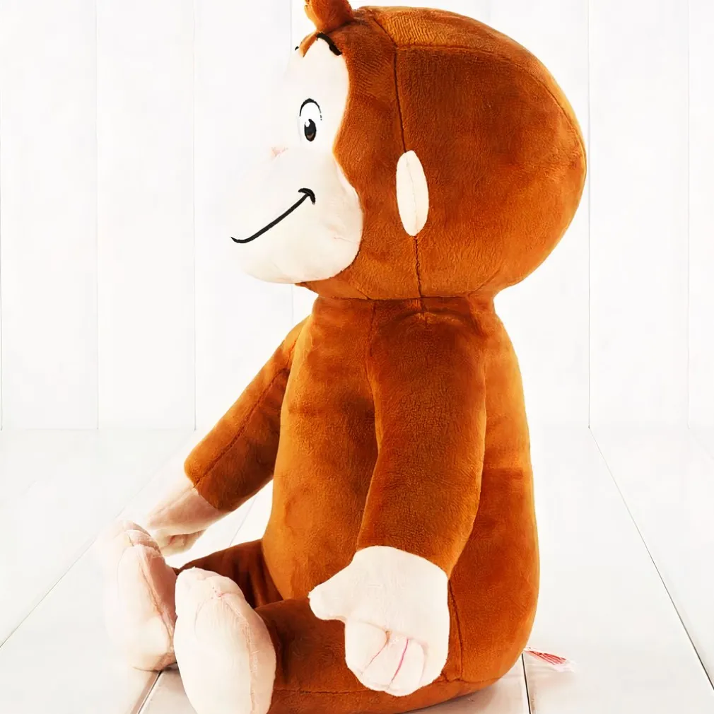 Peluche singe souriante