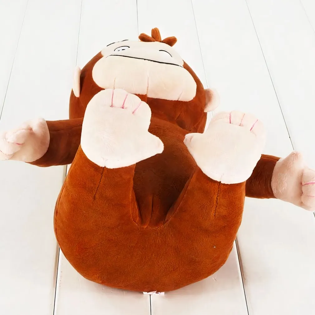 Peluche singe souriante