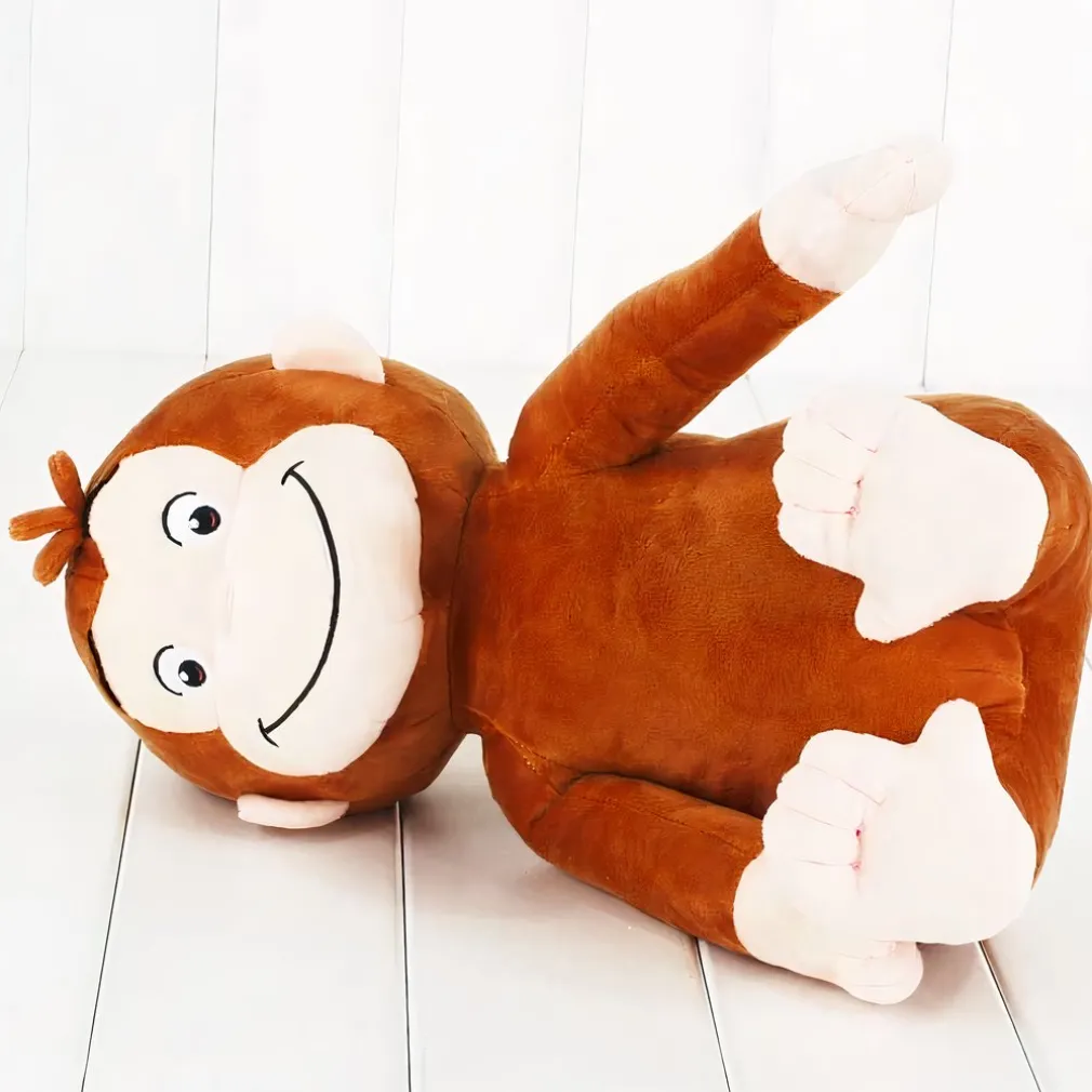 Peluche singe souriante
