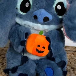 Peluche Stitch avec une citrouille qui respire