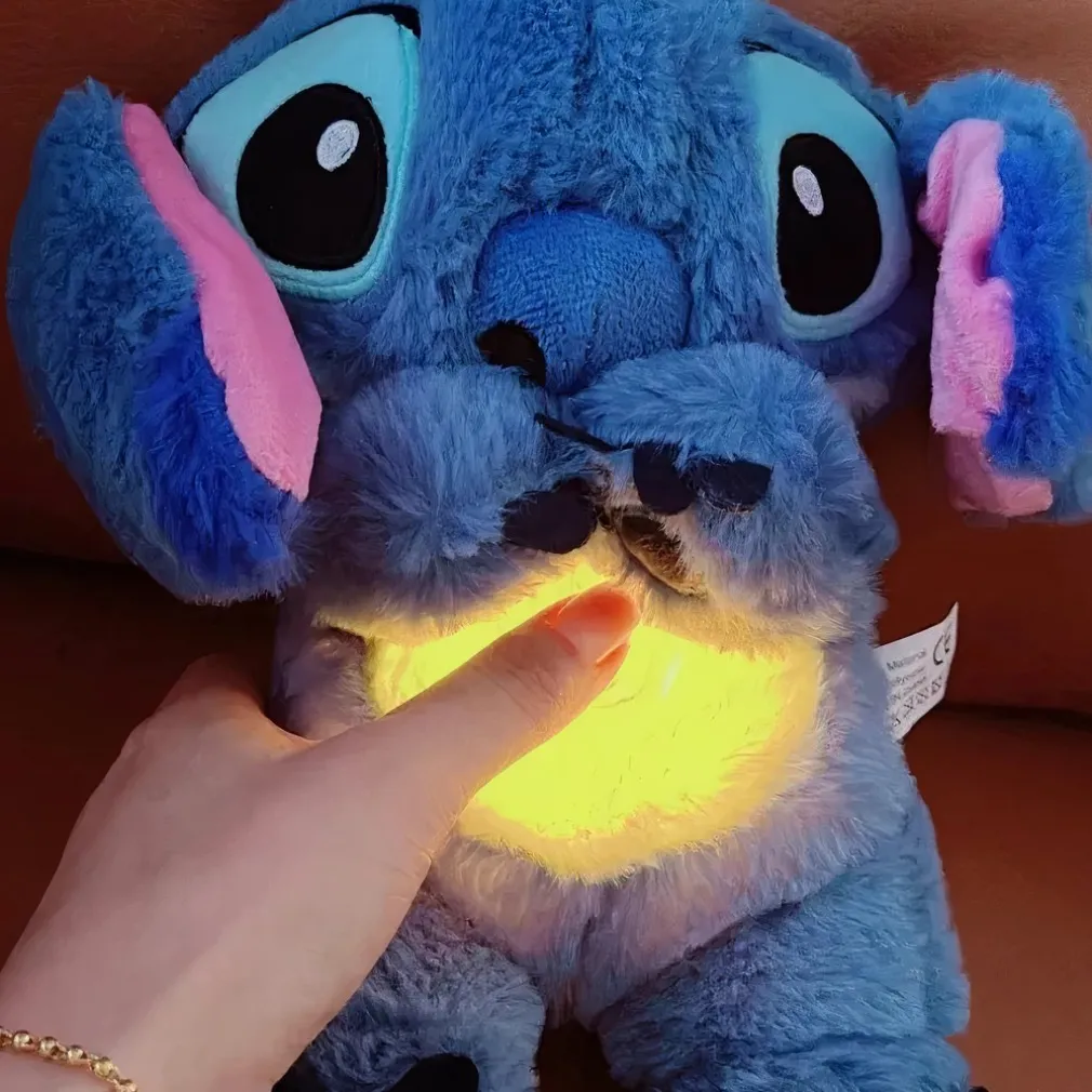 Peluche Stitch qui respire avec berceuse apaisante