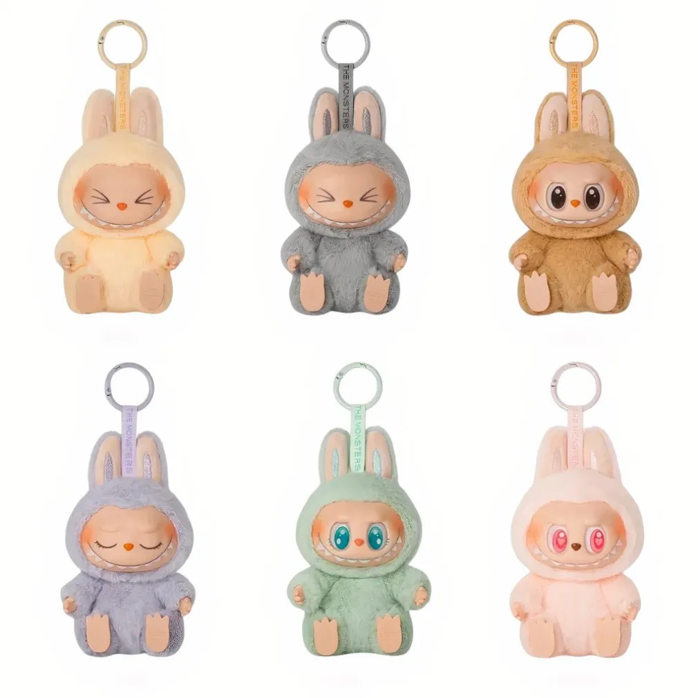Peluche type Labubu boîte mystère assis