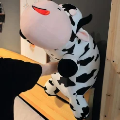 Peluche vache allongée