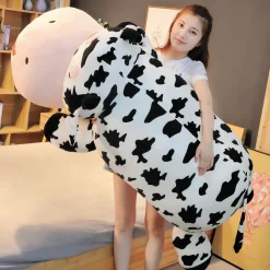 Peluche vache allongée