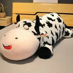 Peluche vache allongée
