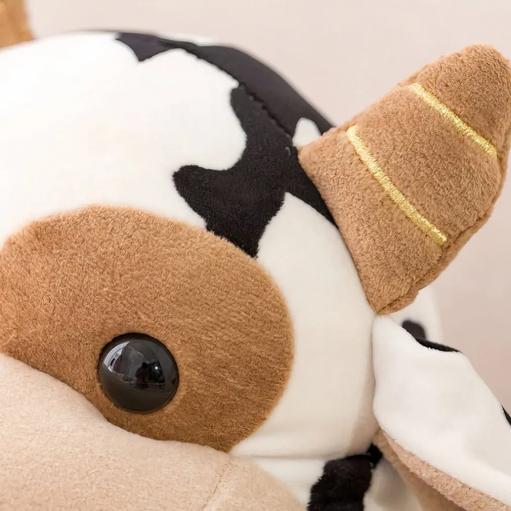 Peluche vache tachetée