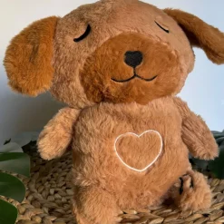 Peluche veilleuse de chien adorable qui respire