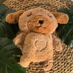 Peluche veilleuse de chien adorable qui respire