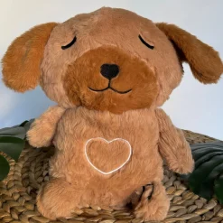 Peluche veilleuse de chien adorable qui respire