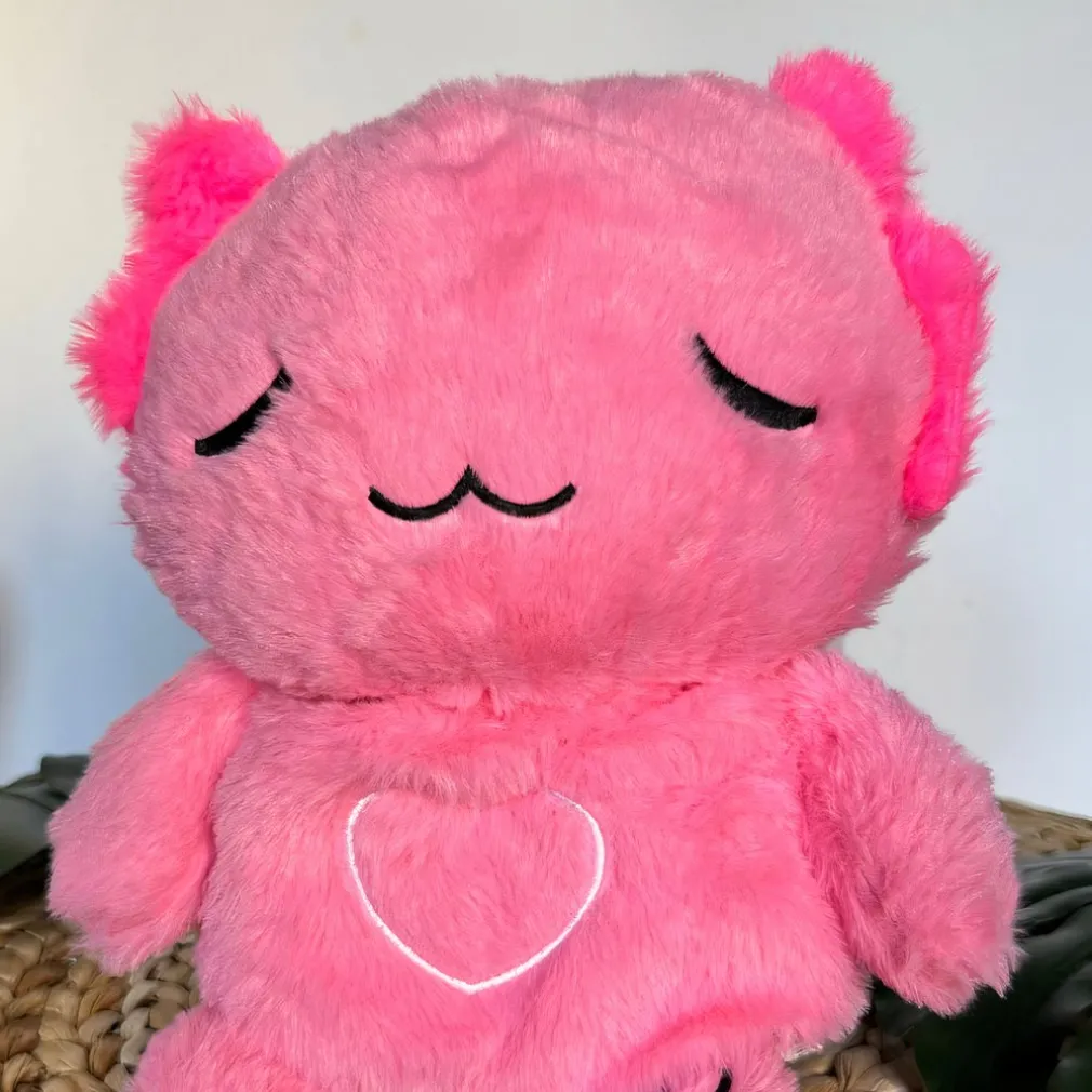 Peluche veilleuse rose d’axolotl qui respire avec berceuses intégrées