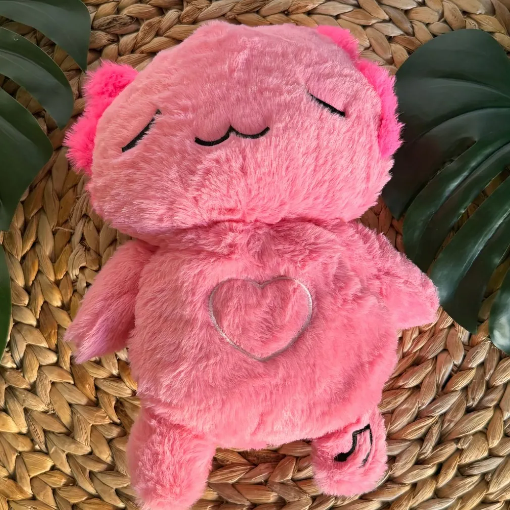 Peluche veilleuse rose d’axolotl qui respire avec berceuses intégrées