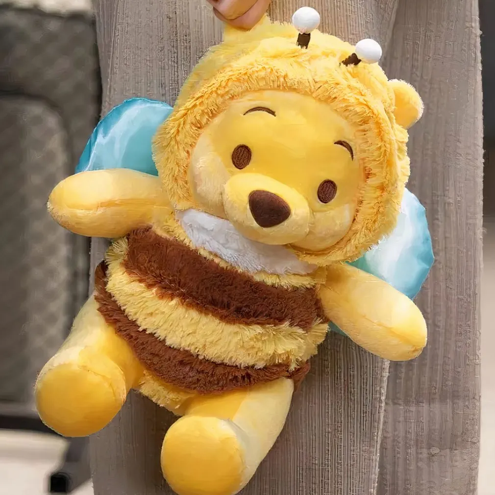 Peluche Winnie l’ourson en abeille