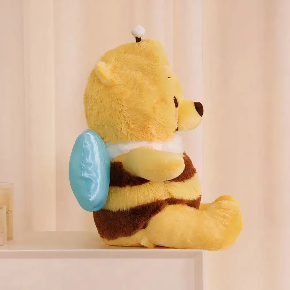 Peluche Winnie l’ourson en abeille