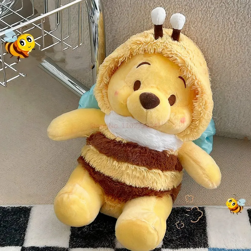 Peluche Winnie l’ourson en abeille