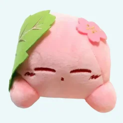 Petite peluche Kirby dans feuille verte