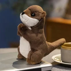 Petite peluche loutre en prière