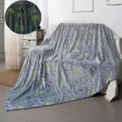 Plaid lumineux en forme de dinosaure