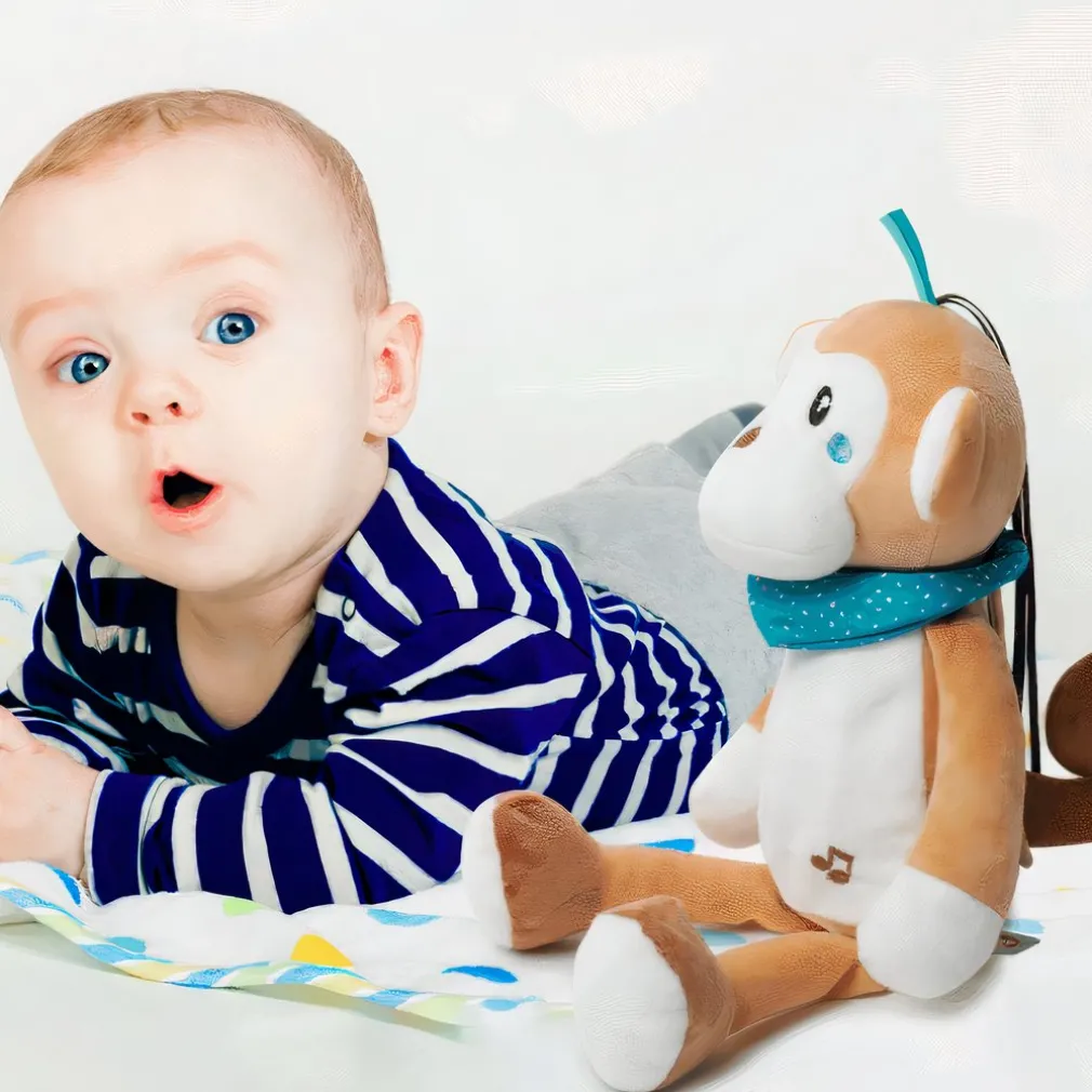 Veilleuse peluche singe musicale