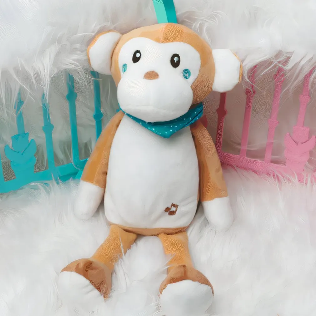 Veilleuse peluche singe musicale